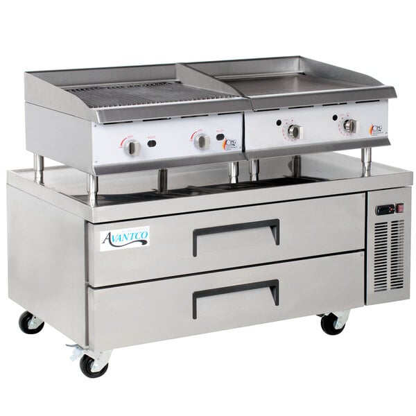 A Cooking Performance Group stainless steel counter with a gas griddle and gas radiant charbroiler over two refrigerated drawers.