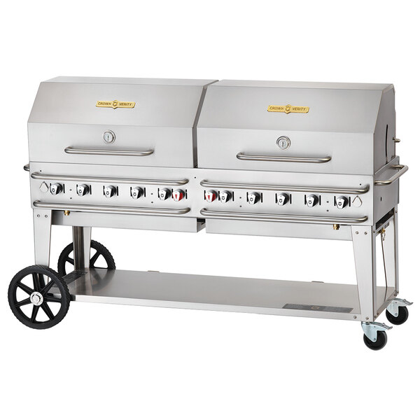 A large silver Crown Verity outdoor grill with wheels.