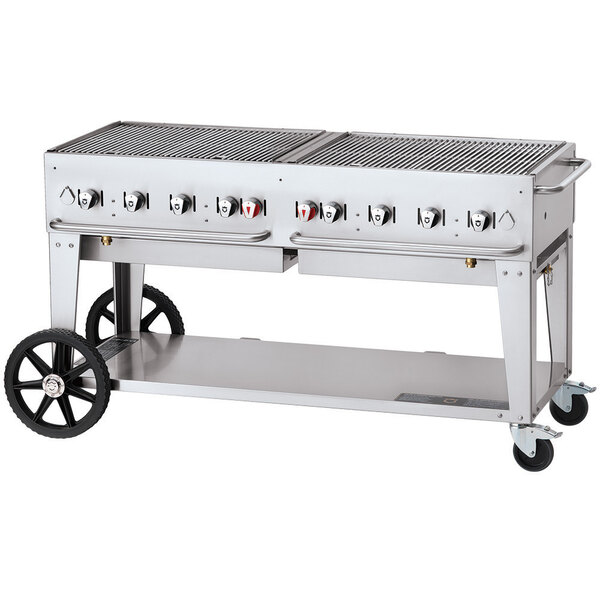 A large Crown Verity stainless steel grill with a cart and wheels.