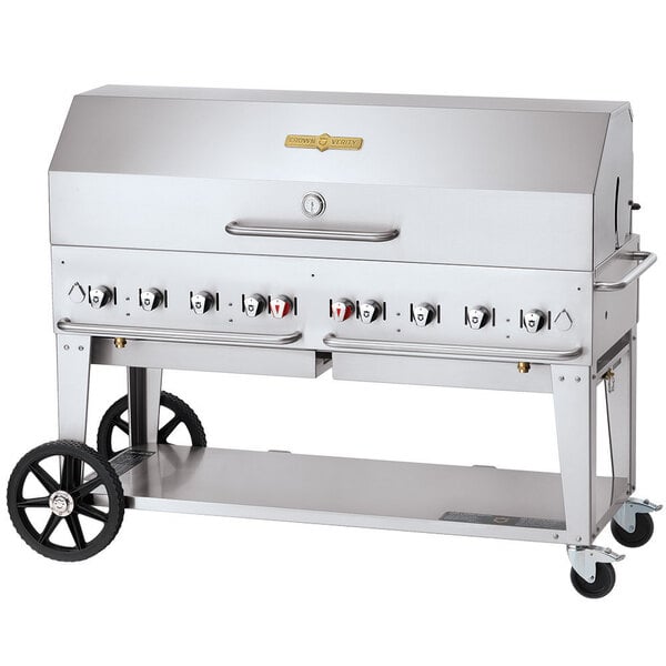 A large stainless steel Crown Verity mobile outdoor grill with wheels.