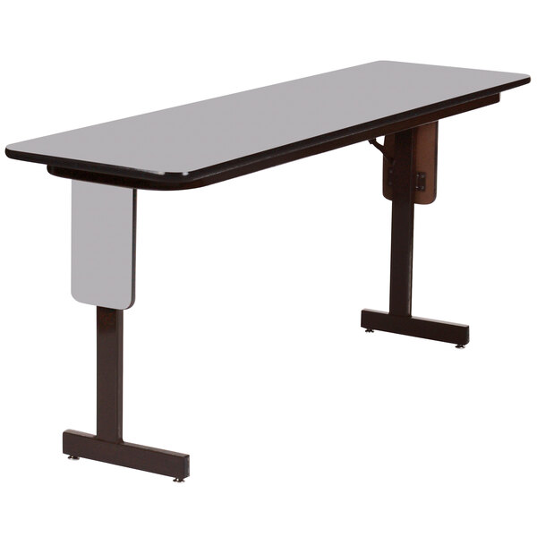A rectangular table with a gray granite finish and black frame.