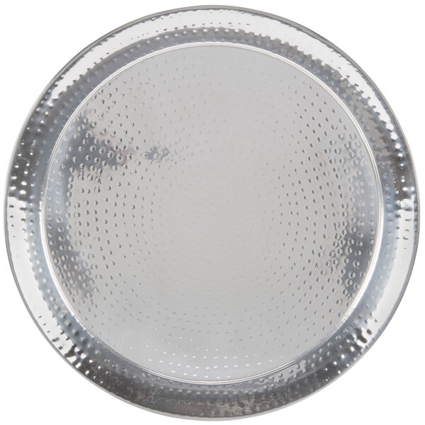 A round silver American Metalcraft stainless steel tray with a hammered texture.