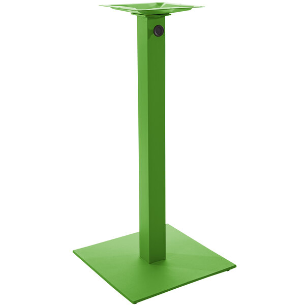 A lime green metal square table base for an outdoor umbrella.