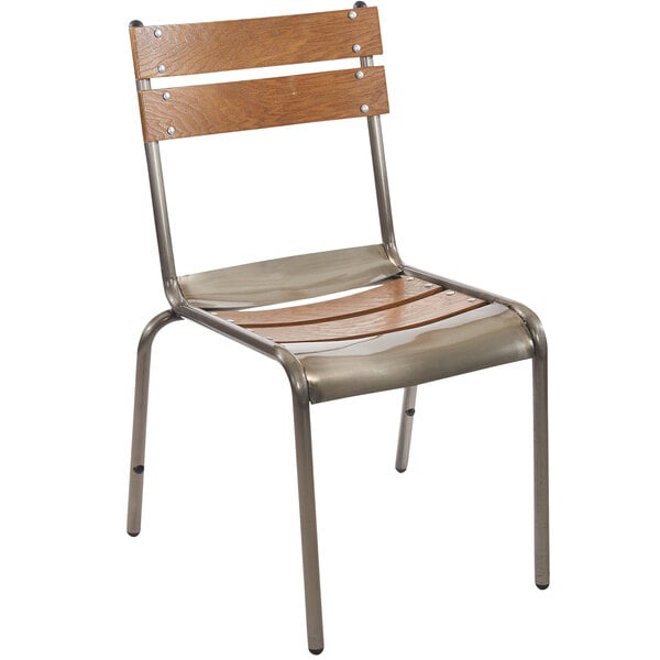 A BFM Seating Dalton side chair with a clear coat metal frame and wood seat and back.