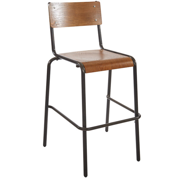 A Nash barstool with a wooden seat and backrest on a black metal frame.