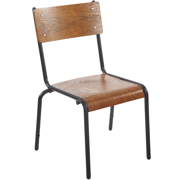 A BFM Seating Nash wood chair with black metal legs.