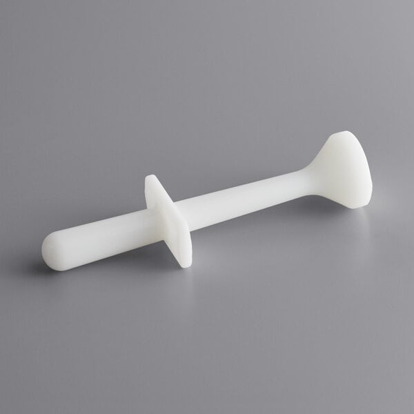 A white plastic plunger for a meat grinder.