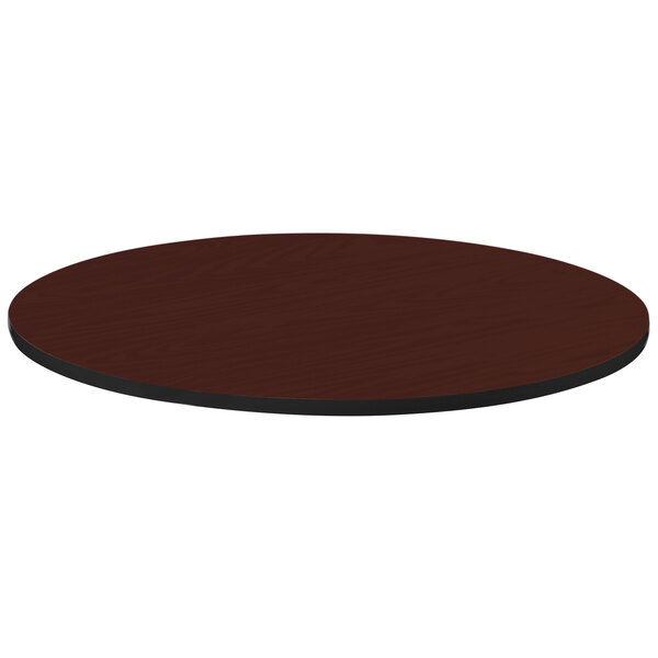 A brown table top with a black edge.