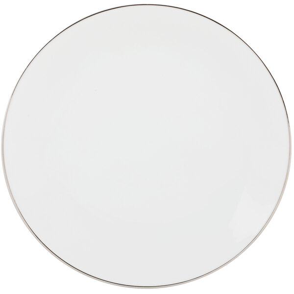 A white porcelain charger plate with a silver rim.