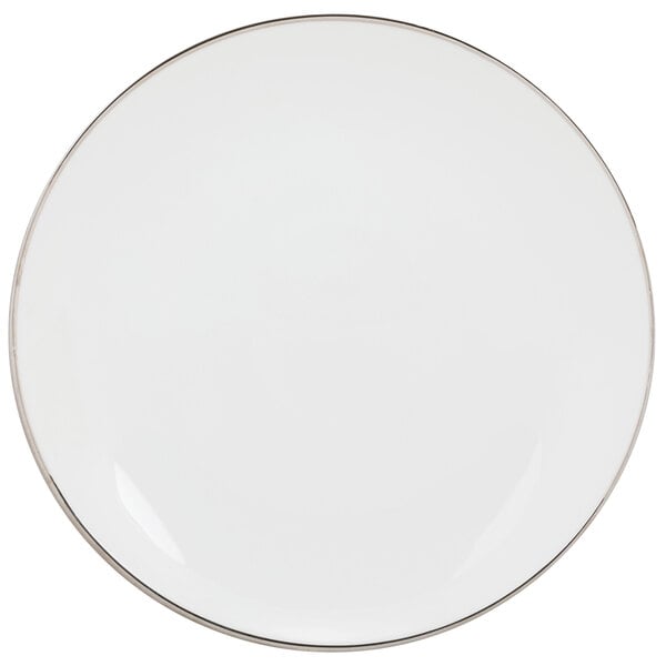 A white 10 Strawberry Street porcelain bread and butter plate with a silver rim.