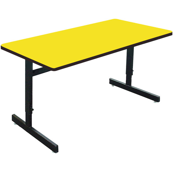 A yellow rectangular Correll computer table with black legs.