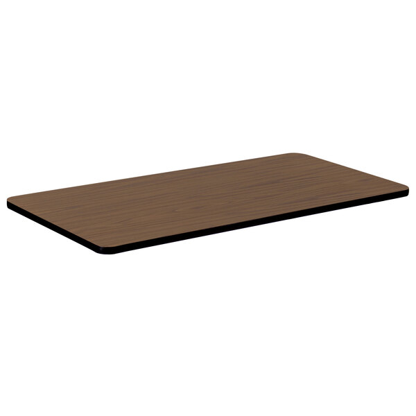 A Correll rectangular wooden table top with a walnut finish.