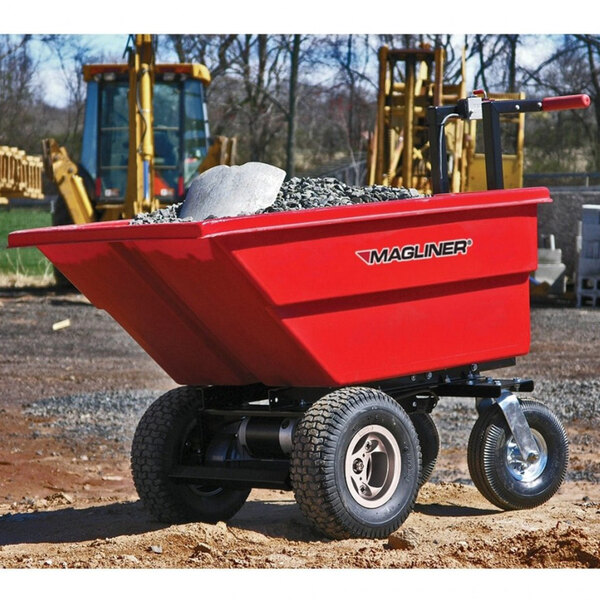 A red Magliner motorized hopper cart with rocks in it.
