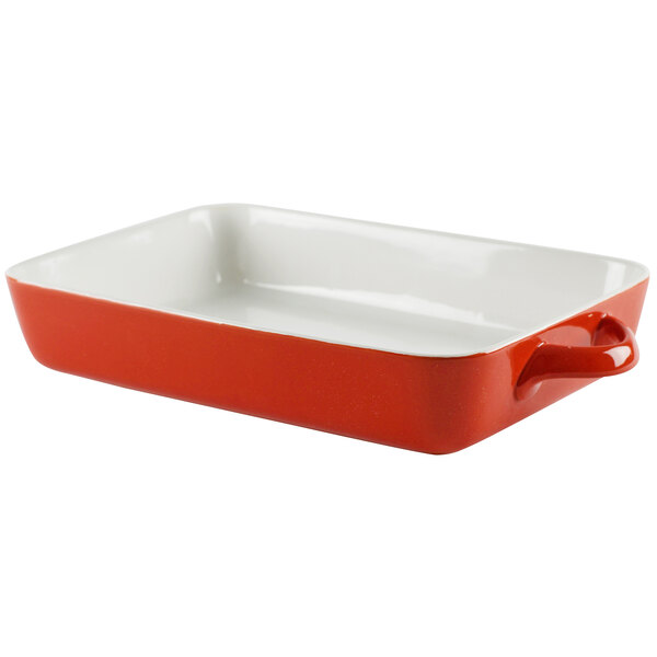 A red and white rectangular baking dish with a lid.