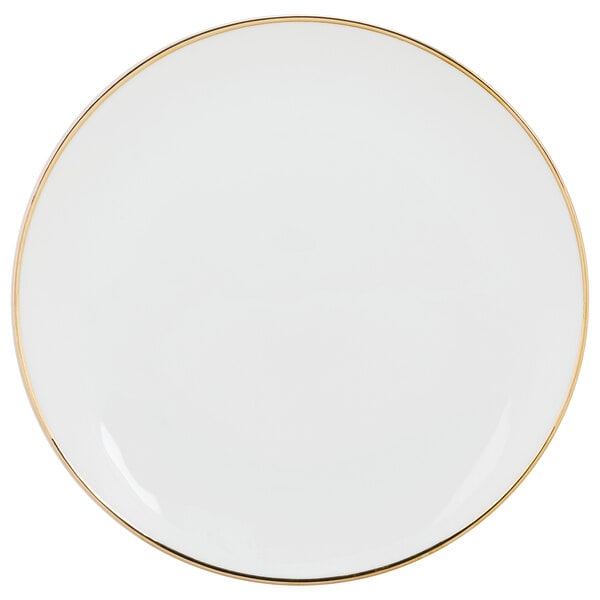 A white 10 Strawberry Street porcelain salad plate with a gold rim.