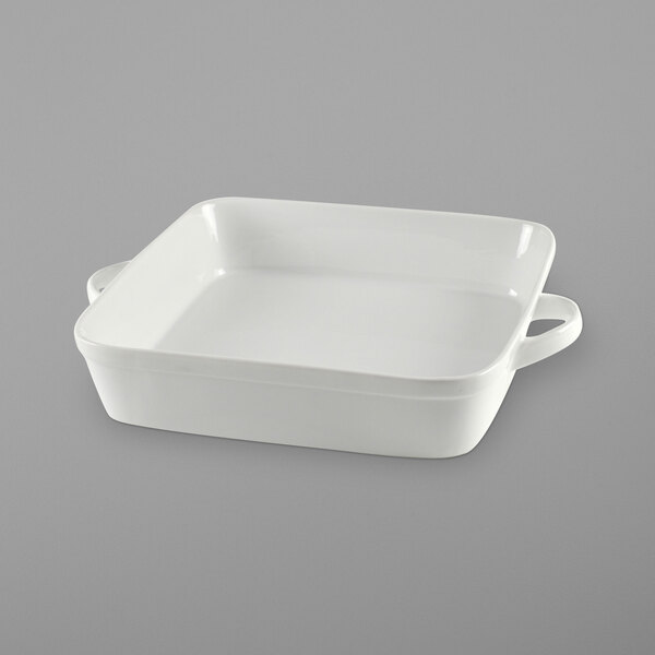 A white square pan with two handles.