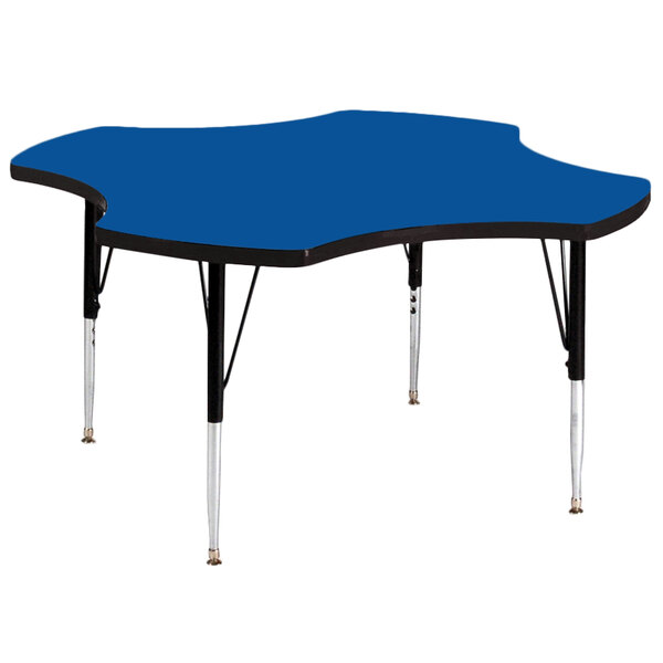 A blue Correll clover-shaped activity table with black legs.