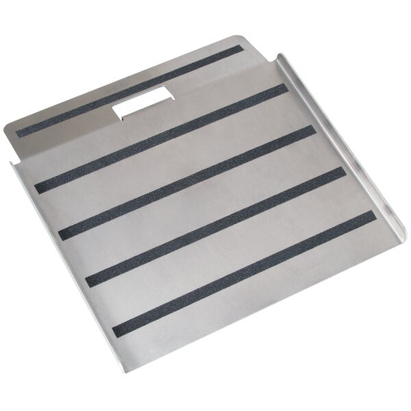 A silver metal plate with black stripes attached to it.