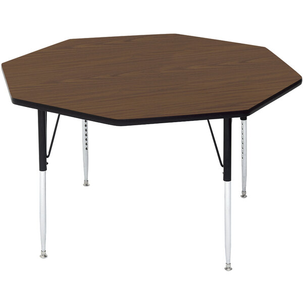 A brown hexagon Correll activity table with black legs.
