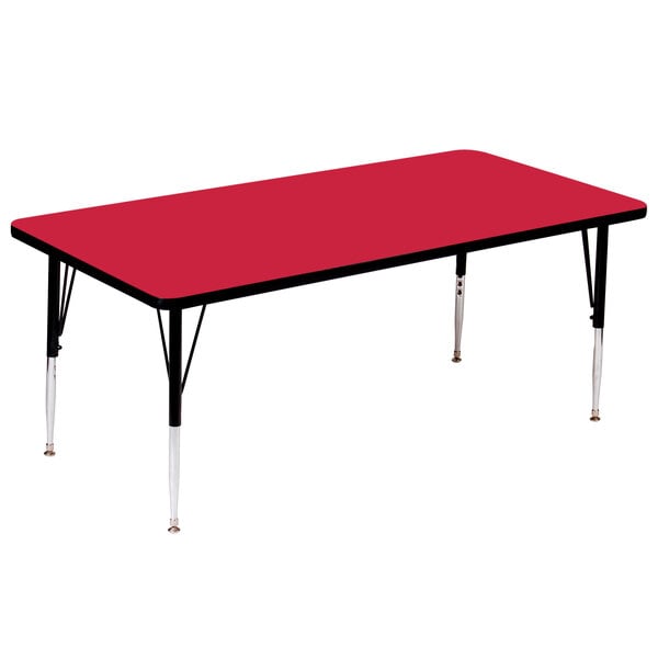 A red rectangular Correll activity table with black legs.