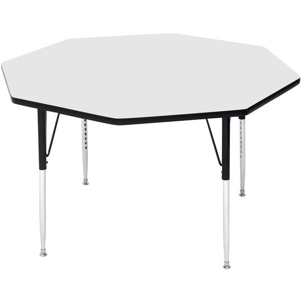 A white octagon Correll activity table with adjustable legs.