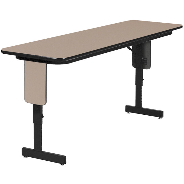 A Correll rectangular table with panel legs and a black base.