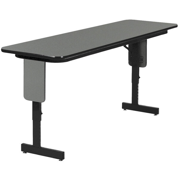 A black rectangular Correll seminar table with Montana granite finish and panel legs.