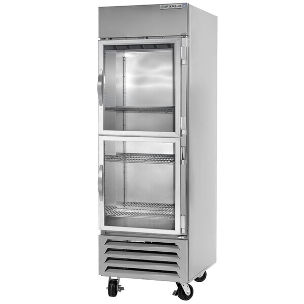A Beverage-Air bottom mounted half glass door reach-in freezer with two shelves.
