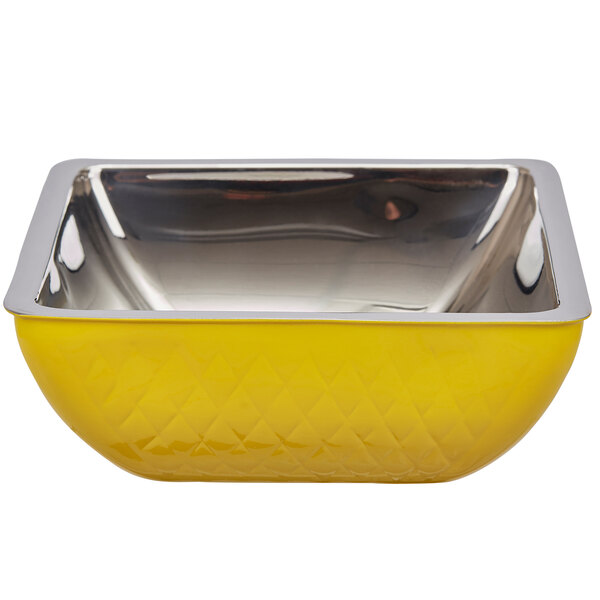 A yellow Bon Chef square bowl with a stainless steel rim.