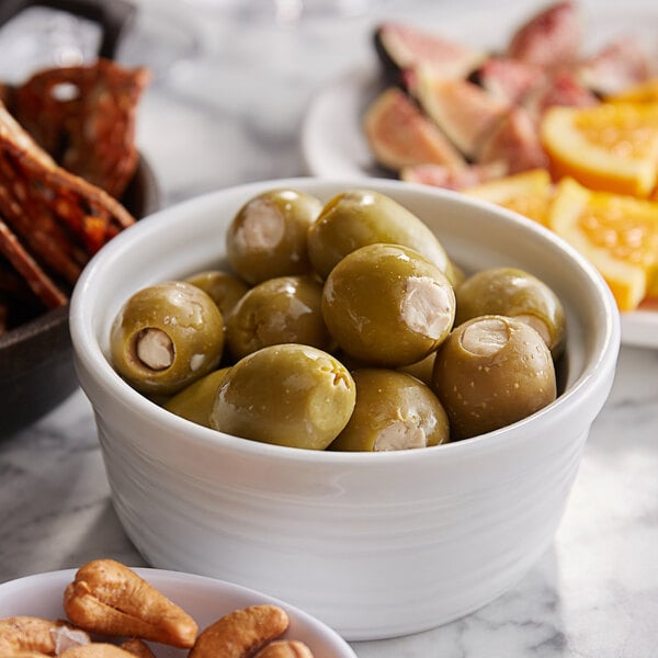 A bowl of green Belosa pepperjack cheese stuffed olives.