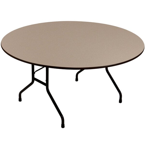 A round Correll folding table with black metal legs.