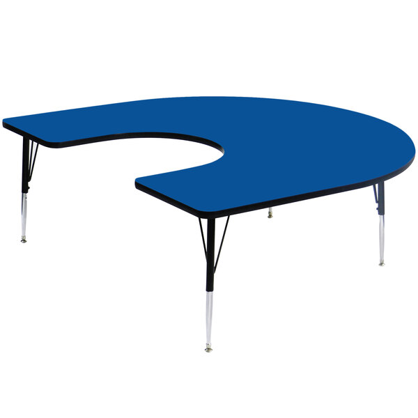 A blue half-moon shaped Correll activity table with adjustable legs.