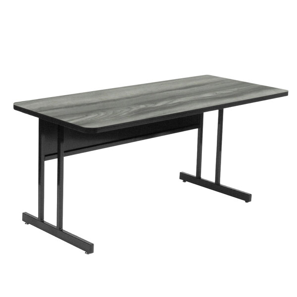 A rectangular black and gray Correll computer table with metal legs.