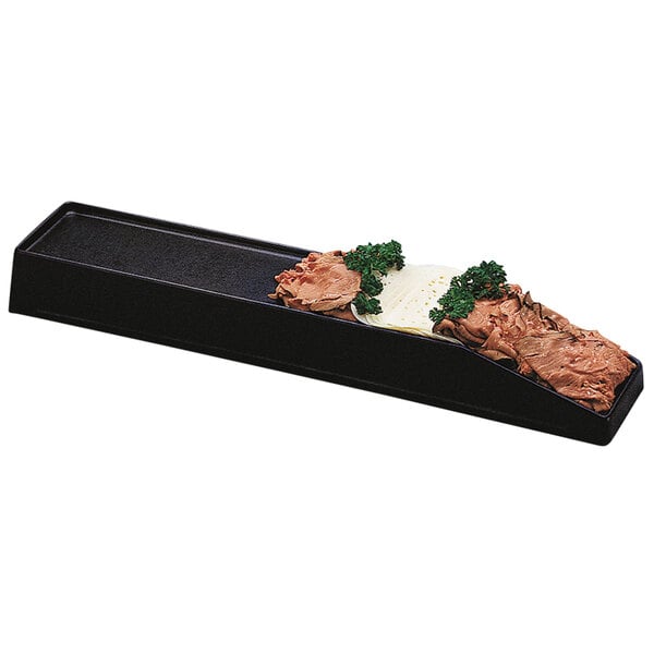 A black rectangular Delfin meat riser with meat and cheese on it.