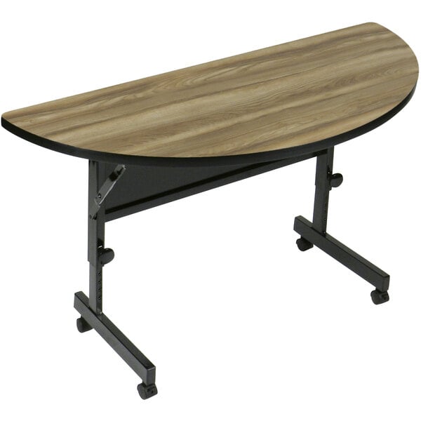 A Correll half round seminar table with a wooden top and black base flipped up.