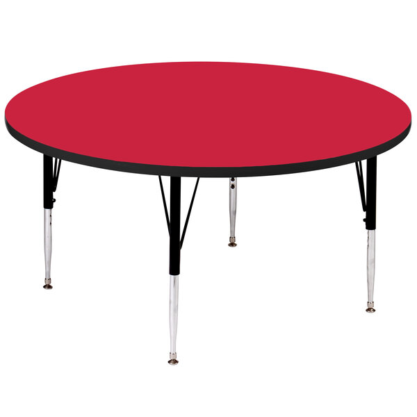 A red Correll round activity table with black legs.