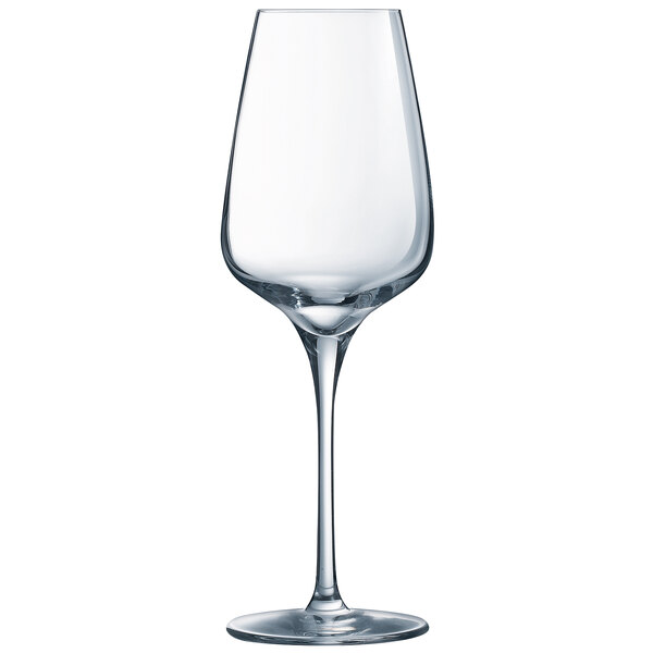 A close-up of a clear Chef & Sommelier wine glass with a long stem.