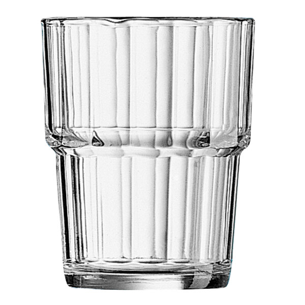 An Arcoroc clear glass with a ribbed rim.