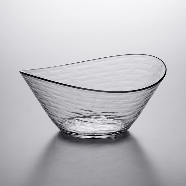 A clear Libbey Tritan plastic oval bowl with a curved edge.