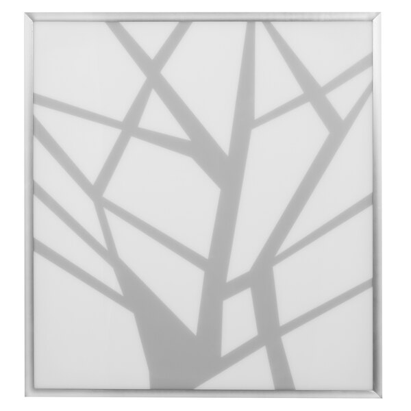 A white square LED front panel with a tree shadow.