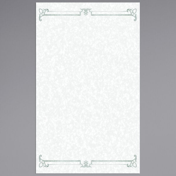 A white paper with a green swirl border.