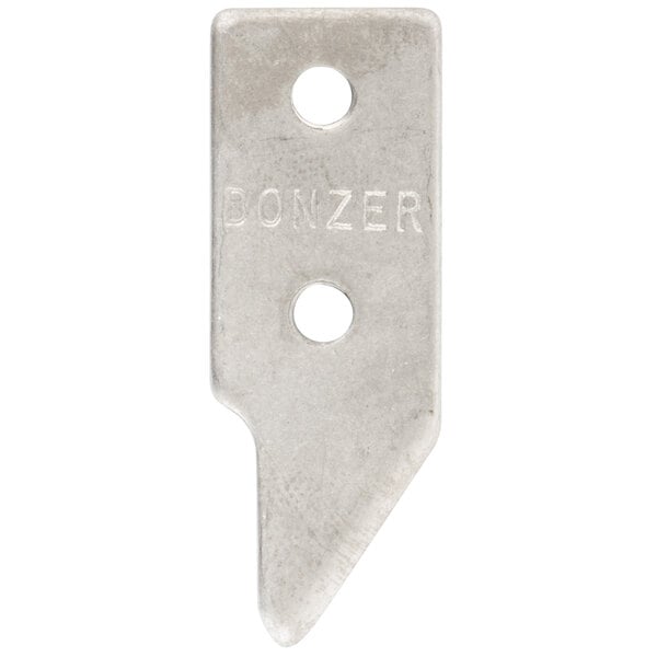 A Vollrath BCO-11 blade with a white circle on a metal piece with holes.
