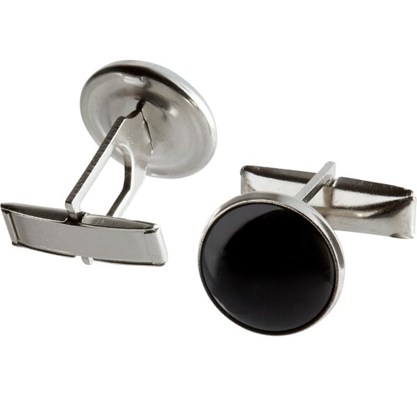 A 2 pack of silver cufflinks with black stones.