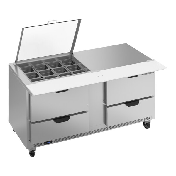 A Beverage-Air stainless steel commercial sandwich prep table with clear lids on metal containers.