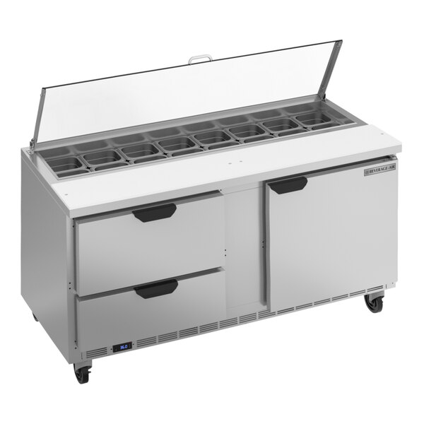 A Beverage-Air sandwich prep table with two drawers and clear lids.