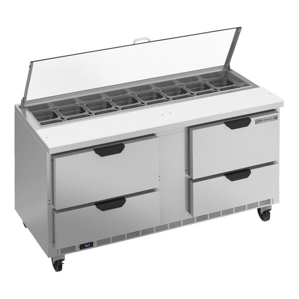 A Beverage-Air silver refrigerated sandwich prep table with drawers.