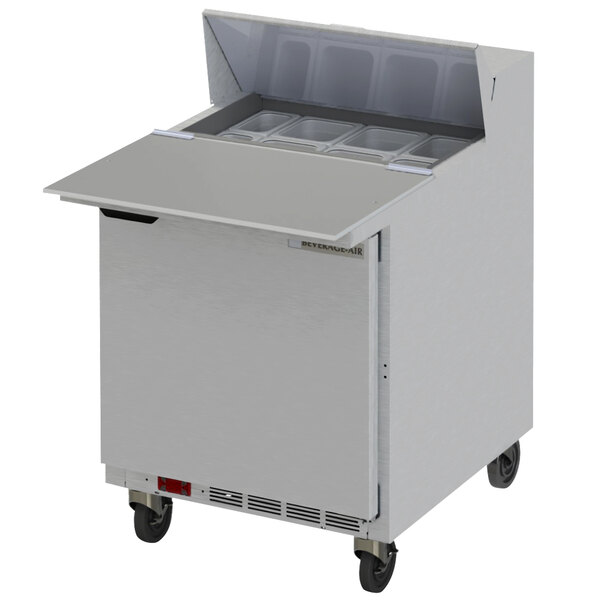 A Beverage-Air stainless steel refrigerator with an open door.