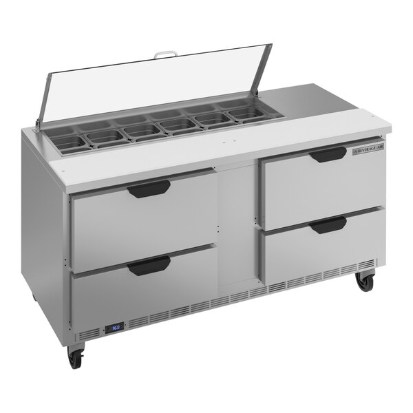 A stainless steel Beverage-Air refrigerated sandwich prep table with clear lids over drawers.