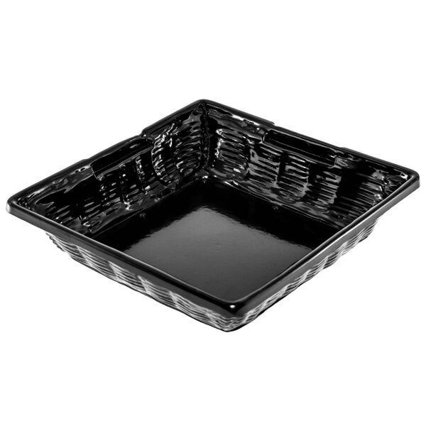 A black square Marco Company plastic basket on a counter.