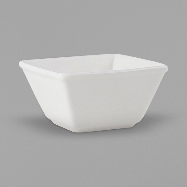 A Tuxton Napa AlumaTux white square china bowl.